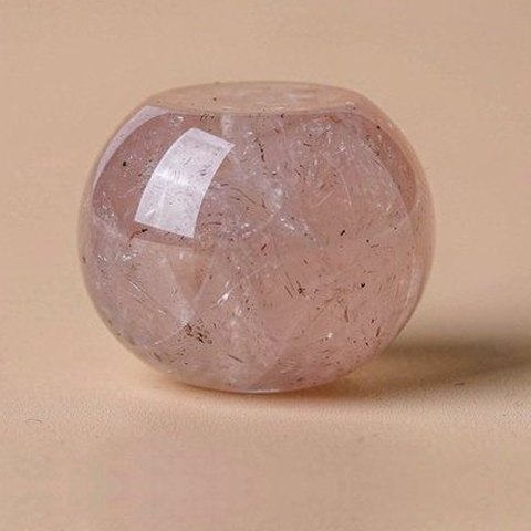 Rose quartz bead, macro photo